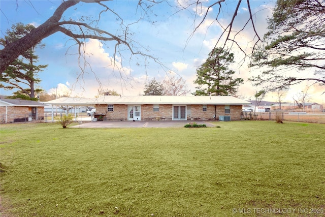 200 S K St, Quinton, OK 74561 - rear view of house featuring a patio and central AC