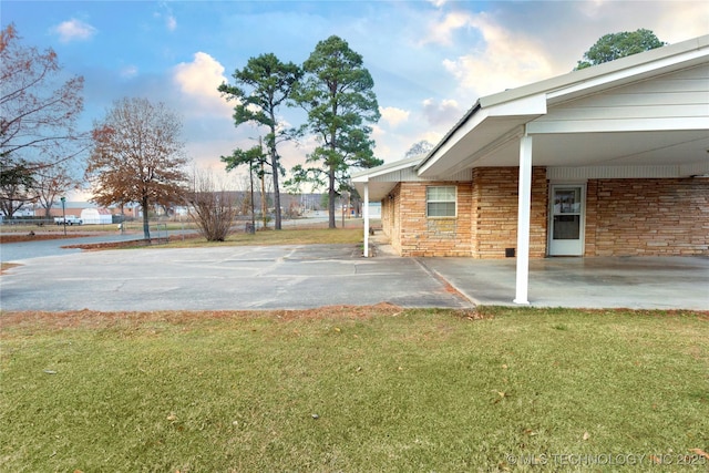 200 S K St, Quinton, OK 74561 - view of basketball court with a lawn