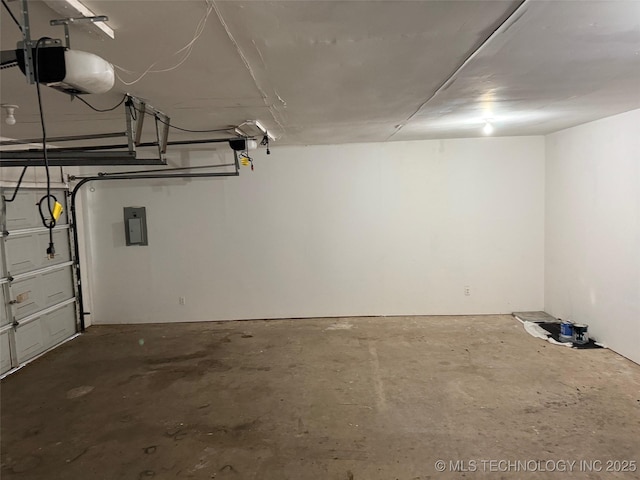 1950 Cimmaron, Wilson, OK 73463 - garage featuring a garage door opener and electric panel