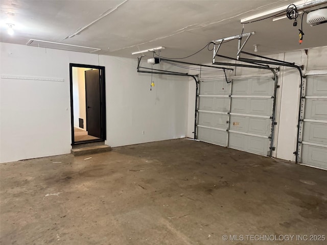 1950 Cimmaron, Wilson, OK 73463 - garage featuring a garage door opener