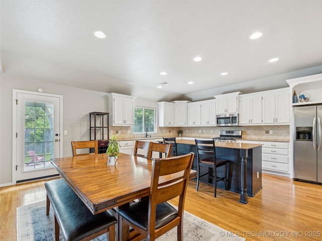 2505 S Willow Ave, Broken Arrow, OK 74012 - dining area featuring light wood-style flooring and recessed lighting
