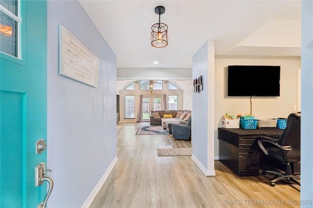 8713 S 77th E Ave, Tulsa, OK 74133 - entrance foyer with baseboards and wood finished floors