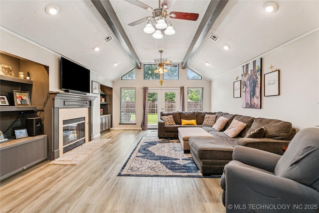 8713 S 77th E Ave, Tulsa, OK 74133 - living area with ceiling fan, light wood-type flooring, and a fireplace with flush hearth