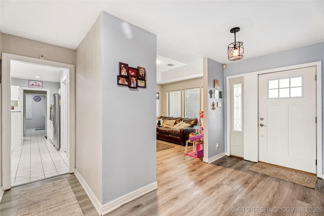 8713 S 77th E Ave, Tulsa, OK 74133 - foyer featuring light wood finished floors and baseboards