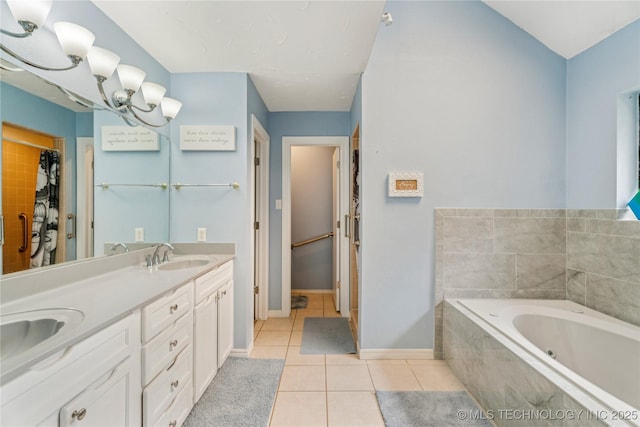 8713 S 77th E Ave, Tulsa, OK 74133 - full bath with tile patterned floors, double vanity, a jetted tub, and baseboards