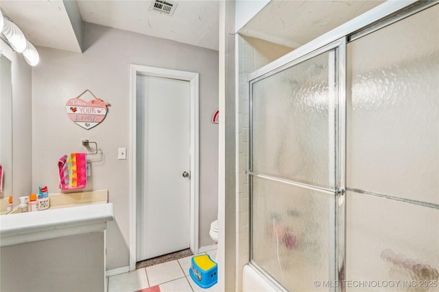 8713 S 77th E Ave, Tulsa, OK 74133 - bathroom featuring toilet, tile patterned flooring, vanity, and baseboards