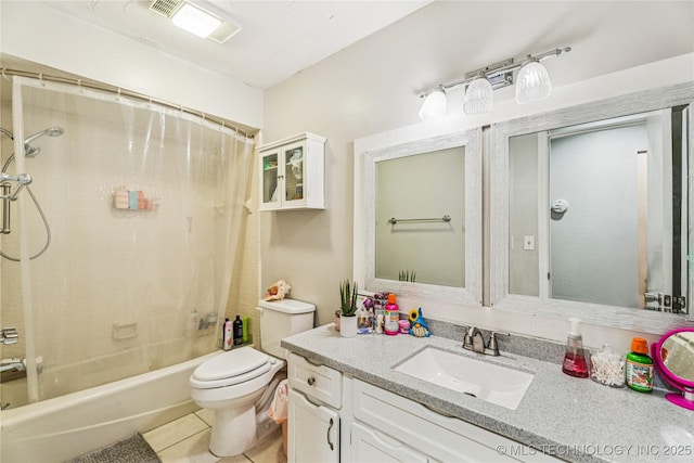 8713 S 77th E Ave, Tulsa, OK 74133 - full bath featuring vanity, toilet, shower / bath combo, and tile patterned flooring