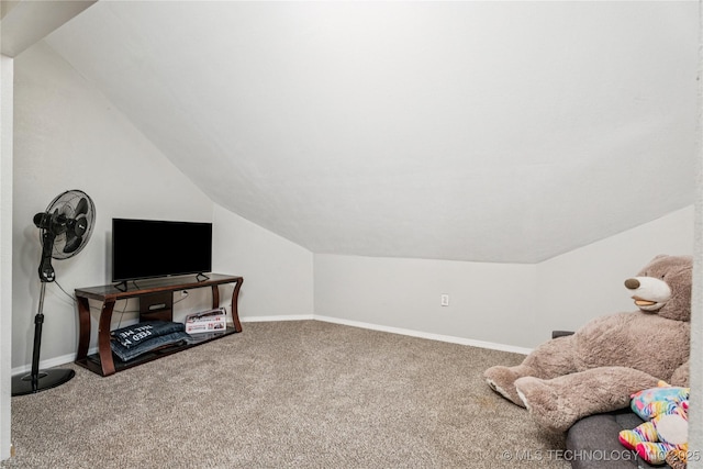 8713 S 77th E Ave, Tulsa, OK 74133 - living area with lofted ceiling, carpet floors, and baseboards