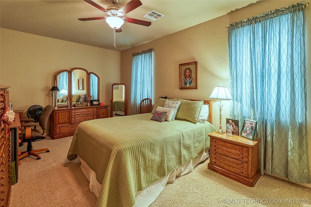 124 Walnut Rdg, Eufaula, OK 74432 - bedroom with carpet floors, multiple windows, and ceiling fan