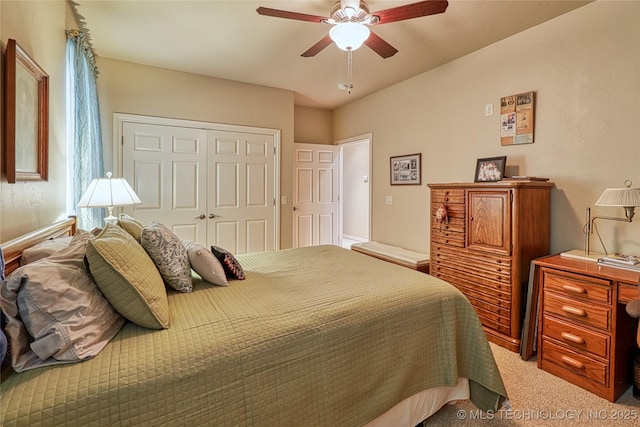 124 Walnut Rdg, Eufaula, OK 74432 - bedroom with a closet, a ceiling fan, and light colored carpet