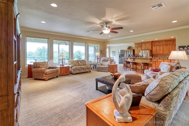 124 Walnut Rdg, Eufaula, OK 74432 - living area with light carpet, ornamental molding, a ceiling fan, and recessed lighting