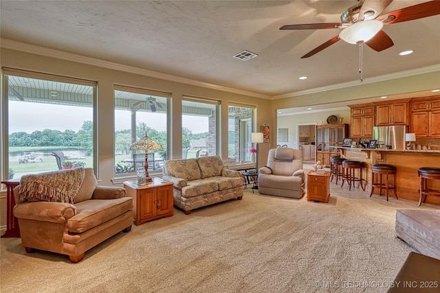 124 Walnut Rdg, Eufaula, OK 74432 - living area with light carpet, a ceiling fan, ornamental molding, and recessed lighting