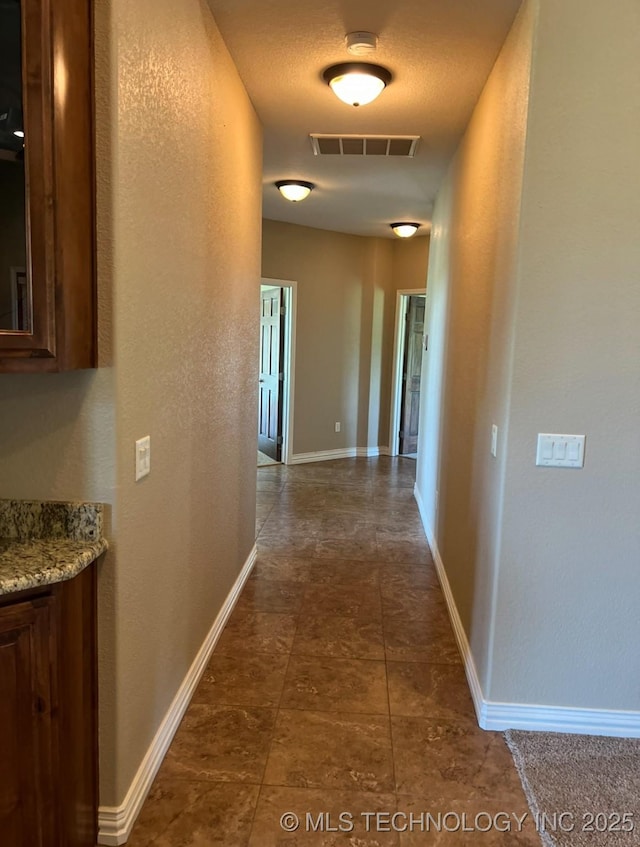 7400 E Prairie View Rd E, Kenefic, OK 74748 - hall with baseboards