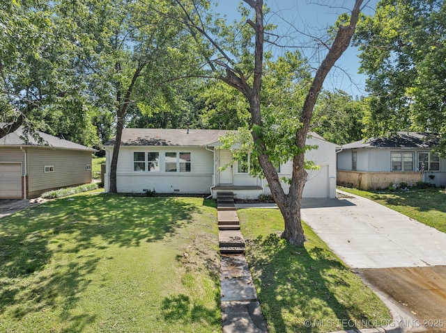 2818 S Pittsburg Ave, Tulsa, OK 74114 - view of front of home featuring driveway, a front lawn, and a garage
