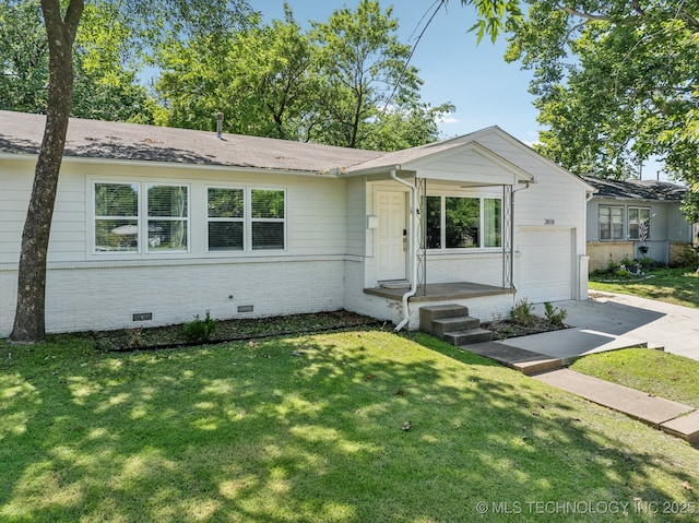 2818 S Pittsburg Ave, Tulsa, OK 74114 - single story home with crawl space, concrete driveway, a front lawn, and brick siding