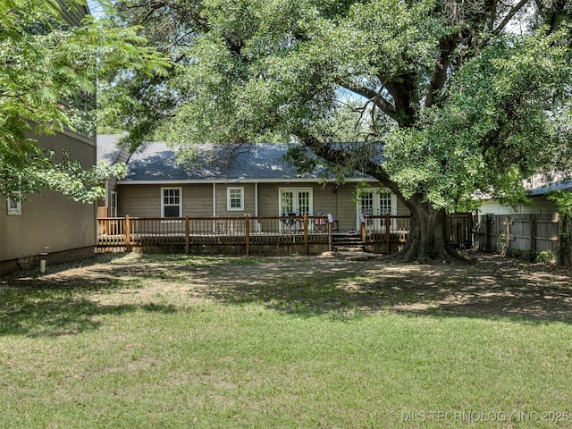 5504 E 5th Pl, Tulsa, OK 74112 - back of property with french doors and a deck