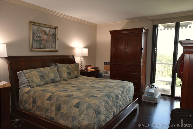 2300 Riverside Dr Unit 5E, Tulsa, OK 74114 - bedroom with dark wood finished floors, access to exterior, and crown molding