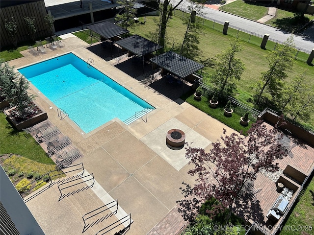 2300 Riverside Dr Unit 5E, Tulsa, OK 74114 - community pool featuring a patio area