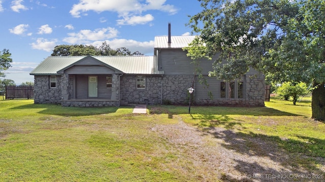 5963 S Westwood Ave, Oilton, OK 74052 - view of front facade with stone siding and metal roof