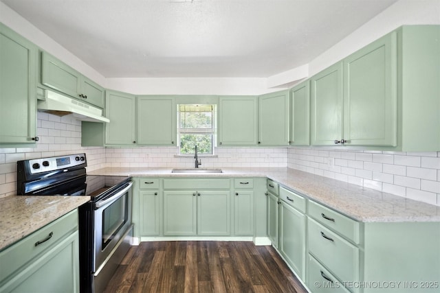 5963 S Westwood Ave, Oilton, OK 74052 - kitchen with stainless steel range with electric cooktop, a sink, green cabinets, under cabinet range hood, and dark wood-style flooring