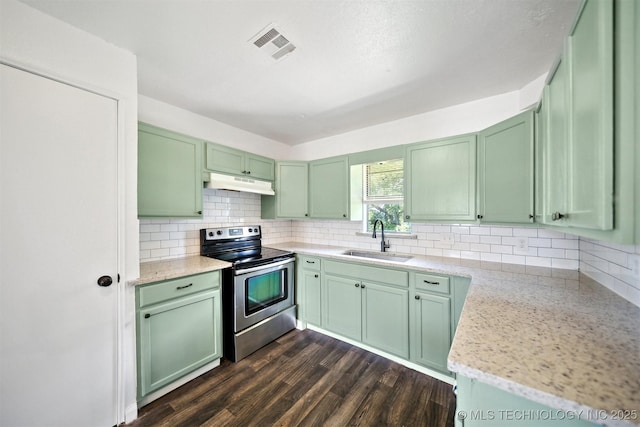 5963 S Westwood Ave, Oilton, OK 74052 - kitchen featuring stainless steel electric range oven, a sink, green cabinetry, and under cabinet range hood