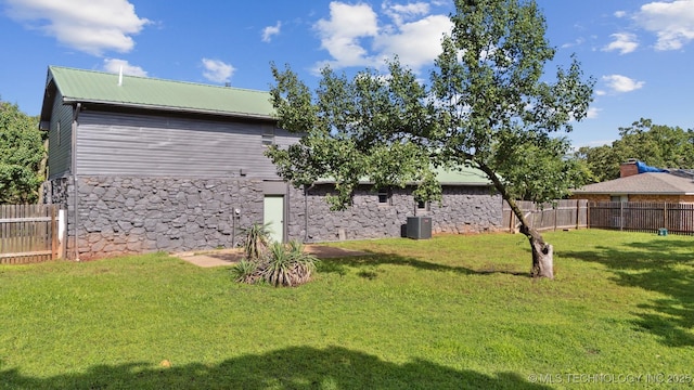 5963 S Westwood Ave, Oilton, OK 74052 - view of yard featuring central air condition unit