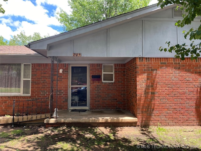205 N Ash St, Bristow, OK 74010 - entrance to property featuring brick siding