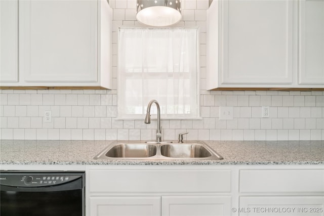 507 S Oklahoma Ave, Haskell, OK 74436 - kitchen featuring dishwasher, a sink, white cabinets, backsplash, and light stone countertops