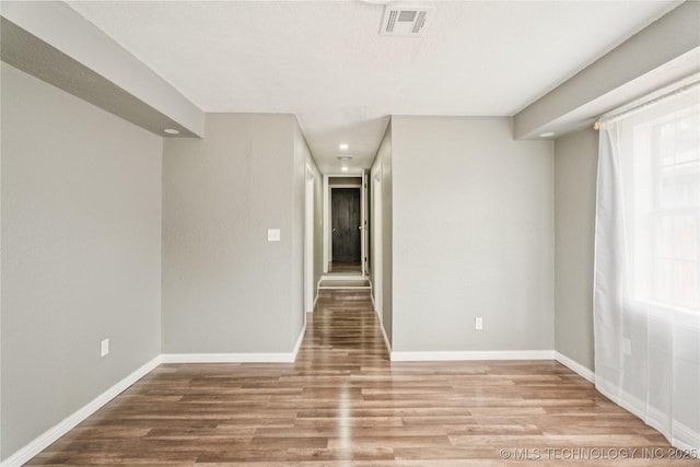 507 S Oklahoma Ave, Haskell, OK 74436 - empty room with wood finished floors, baseboards, and recessed lighting