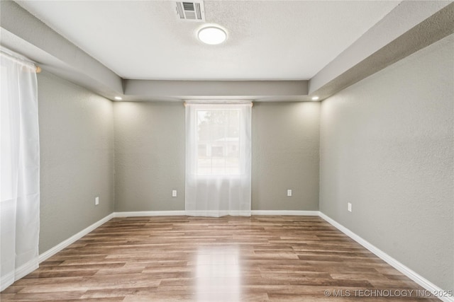 507 S Oklahoma Ave, Haskell, OK 74436 - empty room with wood finished floors and baseboards