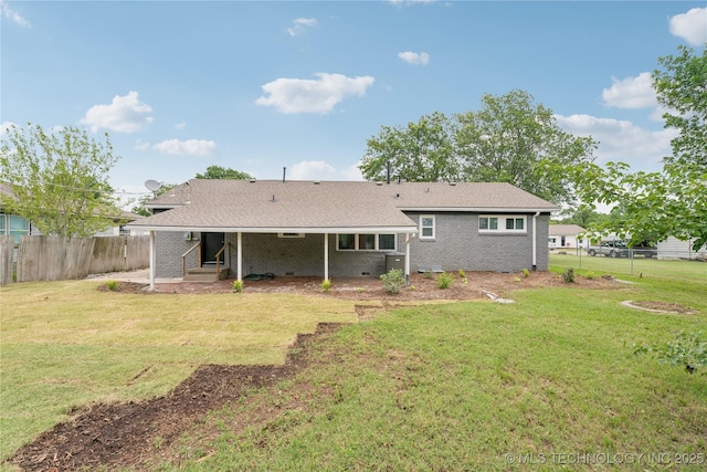 507 S Oklahoma Ave, Haskell, OK 74436 - rear view of house featuring brick siding, a patio, a shingled roof, and entry steps