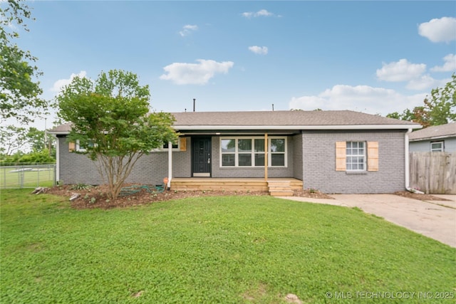 507 S Oklahoma Ave, Haskell, OK 74436 - ranch-style home featuring a porch and brick siding