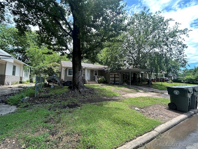1224 N F St, Muskogee, OK 74403 - view of front of property with a detached carport