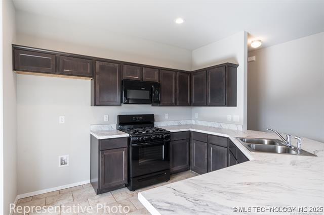 8508 E Queens St, Broken Arrow, OK 74014 - kitchen featuring black appliances, a sink, dark brown cabinetry, a peninsula, and baseboards