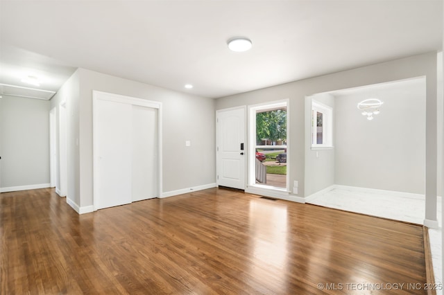 5939 E 26th St, Tulsa, OK 74114 - foyer entrance with wood finished floors and baseboards