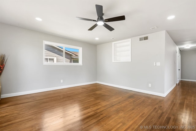 5939 E 26th St, Tulsa, OK 74114 - unfurnished room with ceiling fan, baseboards, wood finished floors, and recessed lighting
