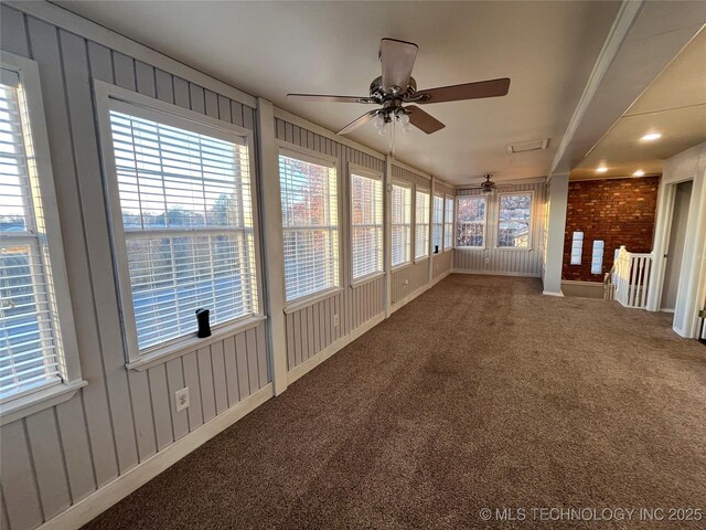 114227 S 4172nd Rd, Checotah, OK 74426 - unfurnished sunroom with ceiling fan and carpet floors