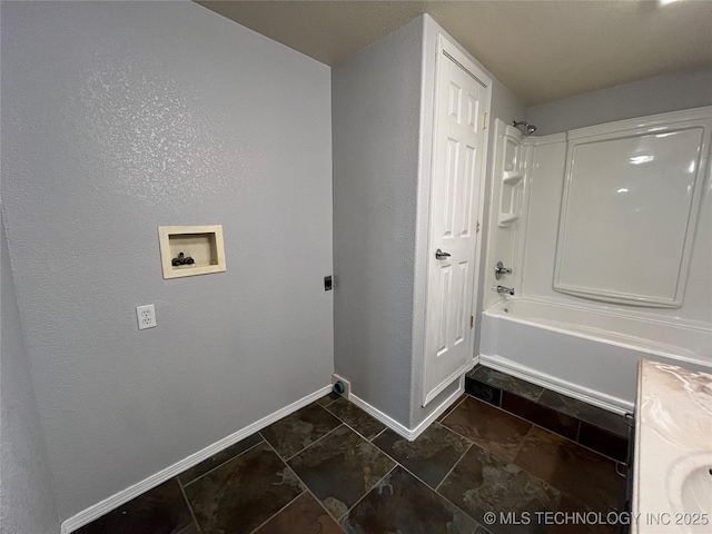 114227 S 4172nd Rd, Checotah, OK 74426 - bathroom featuring baseboards, bathtub / shower combination, and vanity