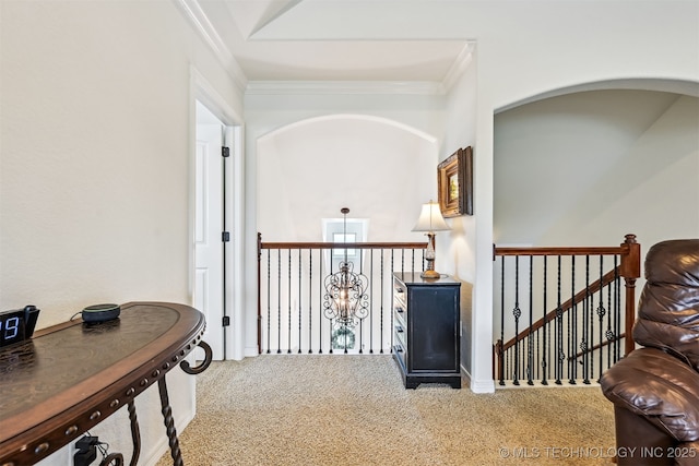 16425 E 49th St, Tulsa, OK 74134 - hall with carpet floors, ornamental molding, an upstairs landing, and arched walkways