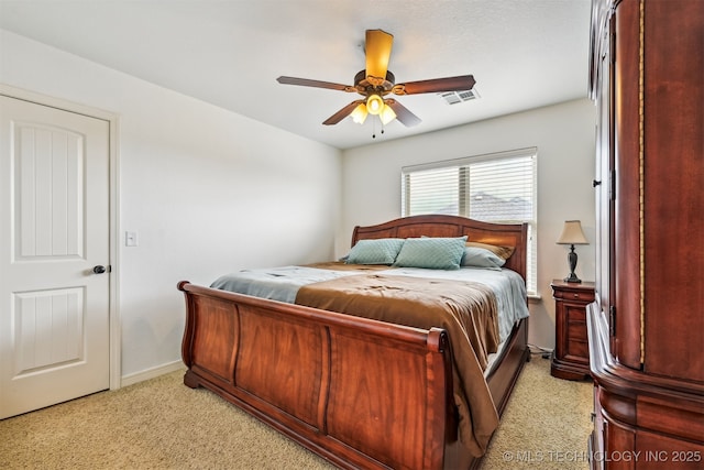 16425 E 49th St, Tulsa, OK 74134 - bedroom featuring light carpet, baseboards, and a ceiling fan