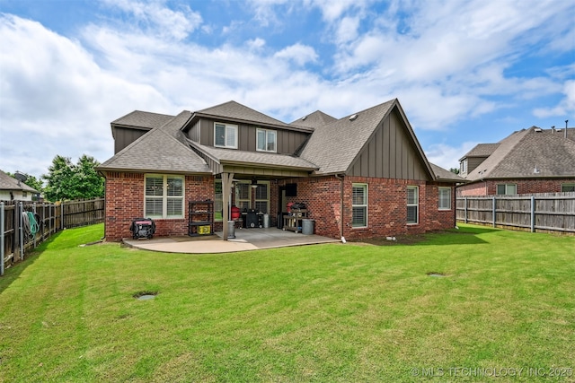 16425 E 49th St, Tulsa, OK 74134 - rear view of property featuring board and batten siding, brick siding, a patio, and a shingled roof