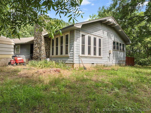 6721 Swayback, Sulphur, OK 73086 - view of side of home featuring crawl space