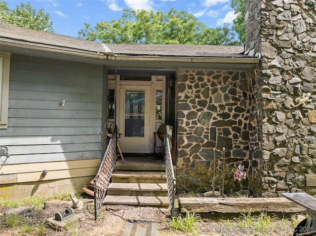 6721 Swayback, Sulphur, OK 73086 - doorway to property featuring stone siding