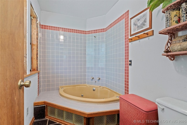 6721 Swayback, Sulphur, OK 73086 - bathroom featuring a tub with jets and toilet