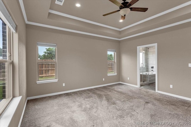 97 Paytons Pl, Durant, OK 74701 - spare room featuring carpet flooring, crown molding, a tray ceiling, a ceiling fan, and baseboards
