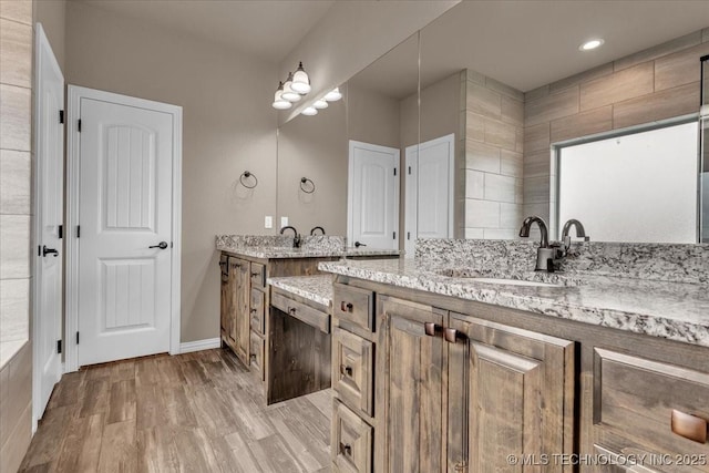 97 Paytons Pl, Durant, OK 74701 - full bath featuring vanity, wood finished floors, and baseboards