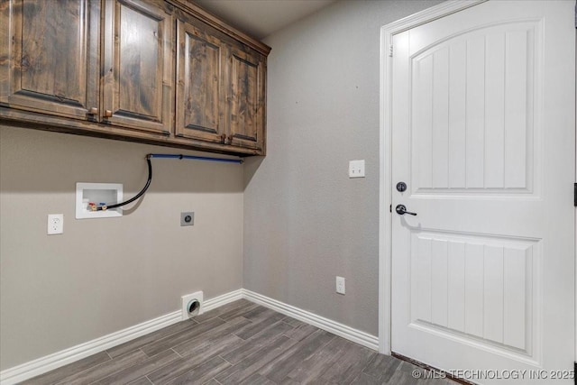 97 Paytons Pl, Durant, OK 74701 - washroom featuring hookup for an electric dryer, cabinet space, washer hookup, dark wood finished floors, and baseboards