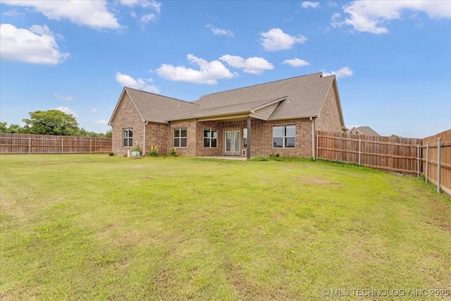 97 Paytons Pl, Durant, OK 74701 - back of property featuring brick siding, french doors, and a shingled roof