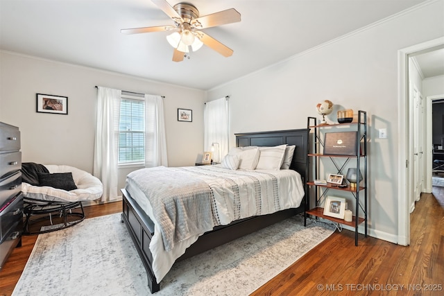3510 E 21st Pl, Tulsa, OK 74114 - bedroom with dark wood-type flooring, ornamental molding, and ceiling fan