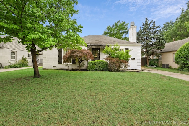 3510 E 21st Pl, Tulsa, OK 74114 - obstructed view of property featuring a chimney, a front yard, and central AC unit